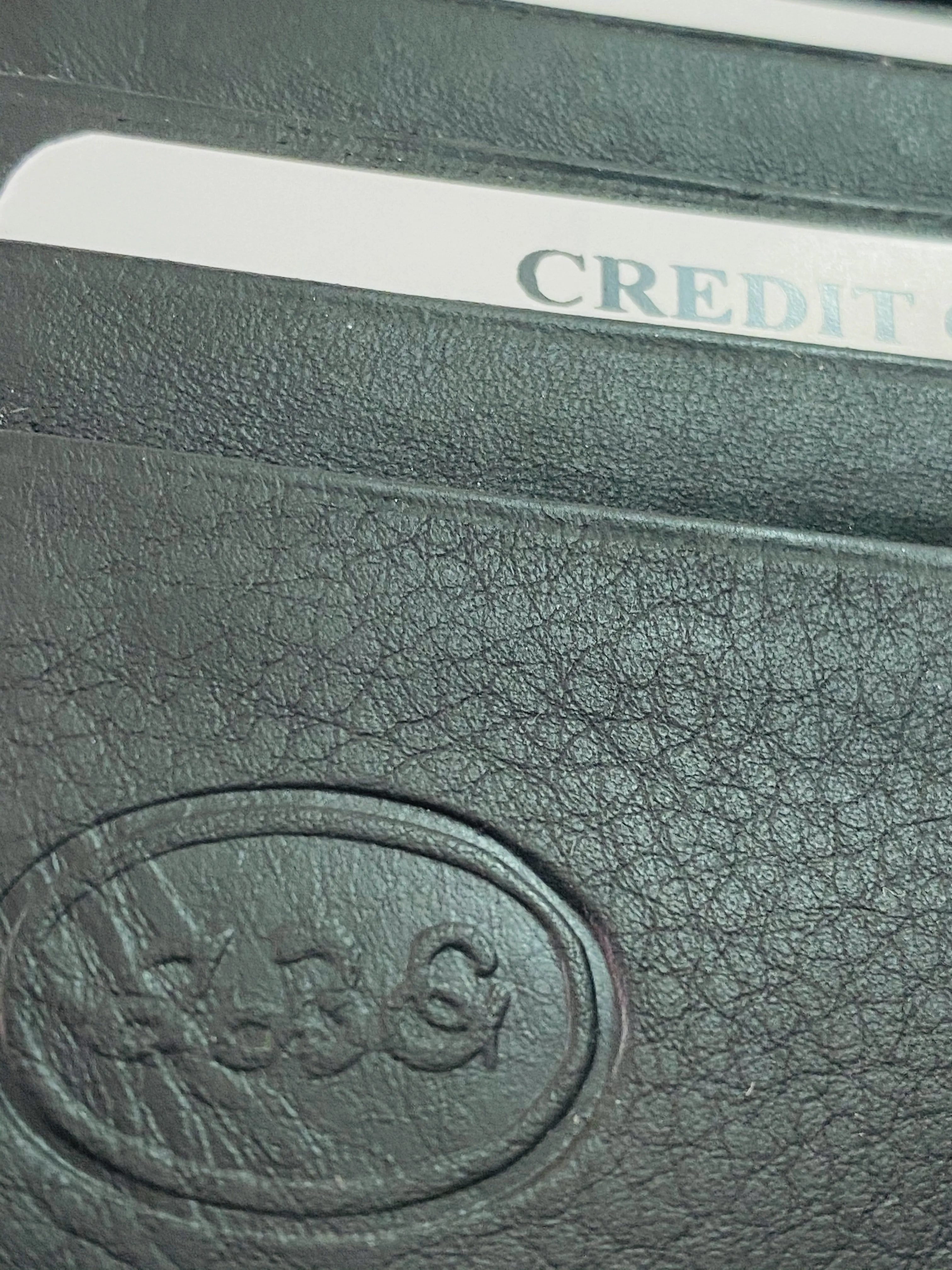 Black Bifold Wallet Featuring Snap Closure Coin Pouch Made with Genuine Leather